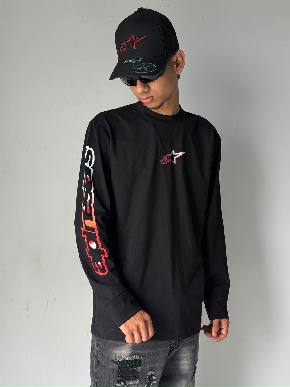 BUZO MANGA LARGA ALPINESTAR NEGRO LOGO NARANJA